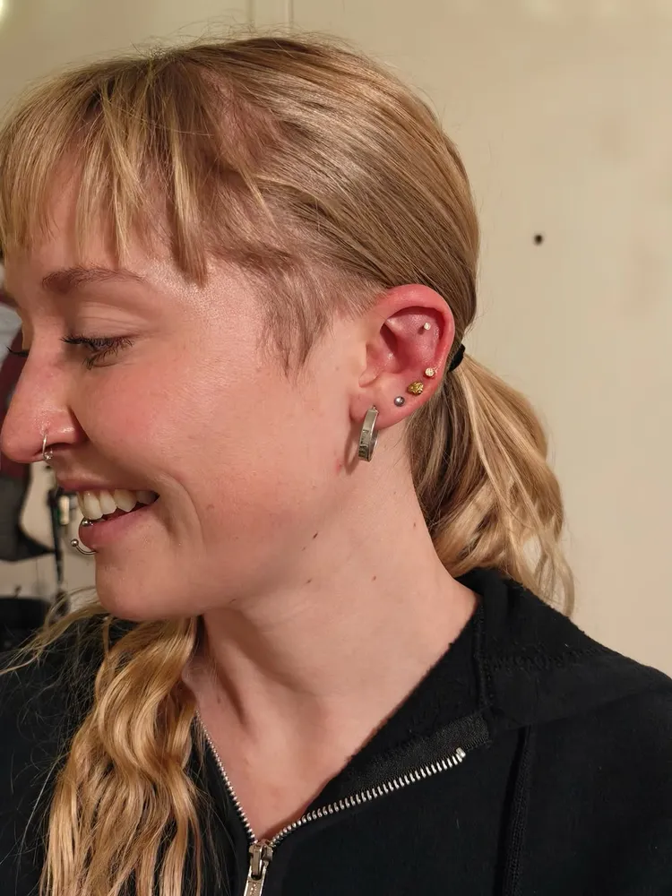 Stacked lobe piercings, curated
